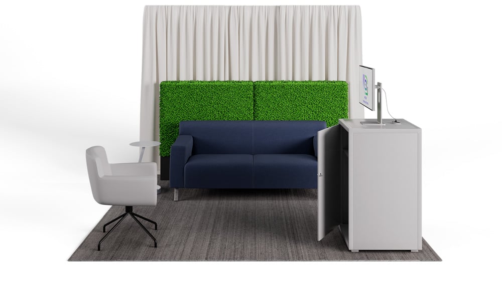 green soft seating set up with life like trees and orange accents