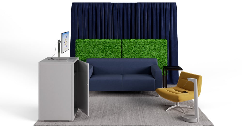 green soft seating set up with life like trees and orange accents