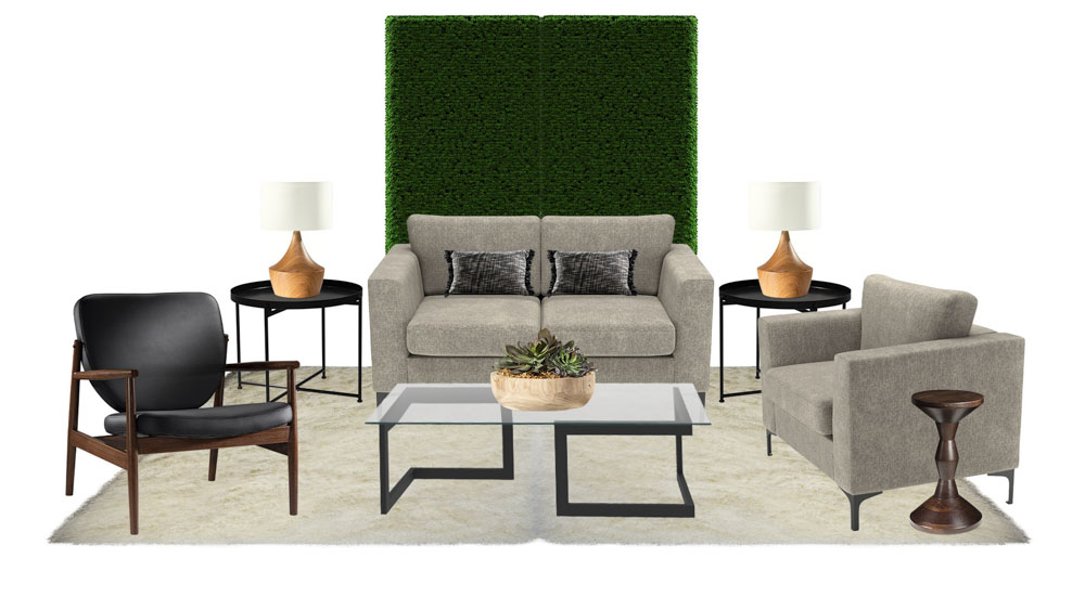 green soft seating set up with life like trees and orange accents