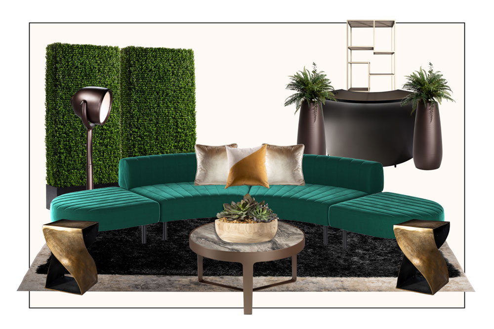 green soft seating set up with life like trees and orange accents