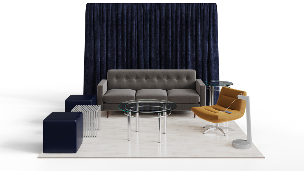 green soft seating set up with life like trees and orange accents