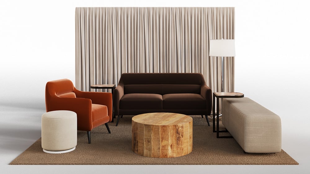 green soft seating set up with life like trees and orange accents