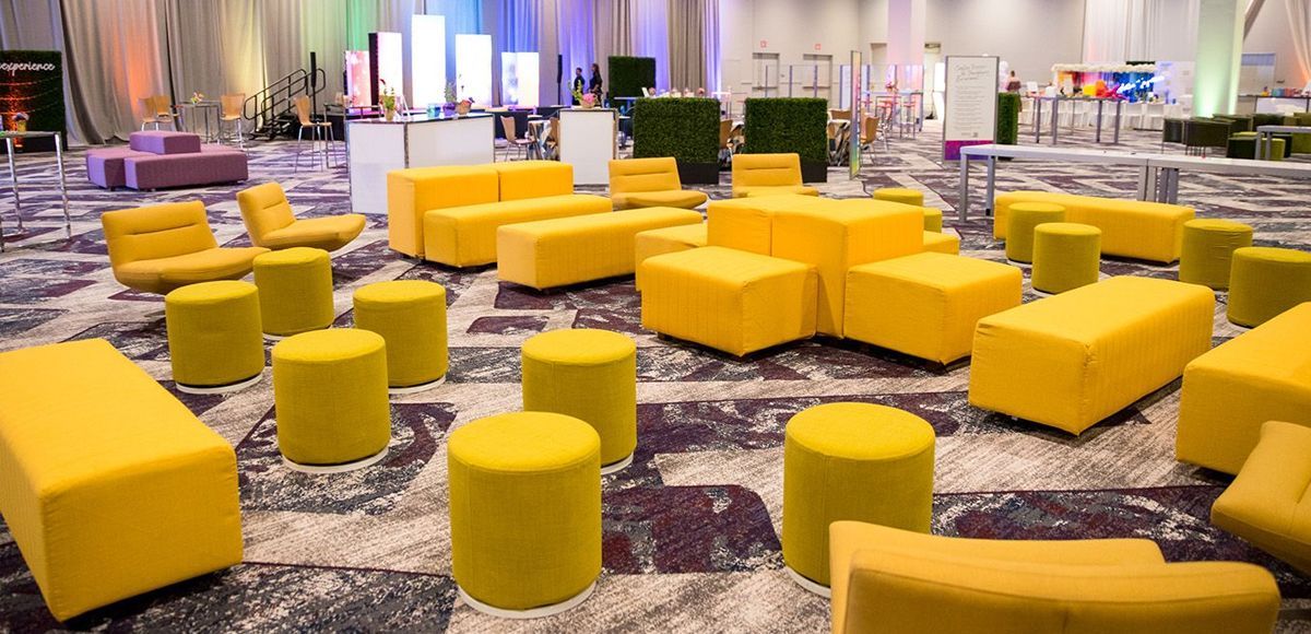 NACE 2022 with yellow furniture from CORT Events