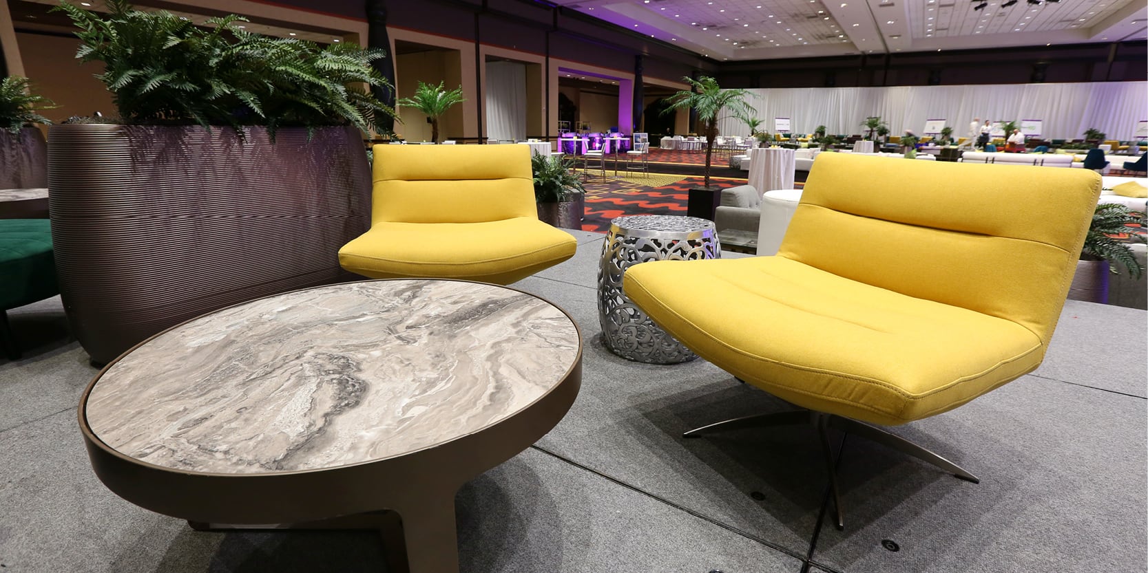 yellow chairs with gray marble table