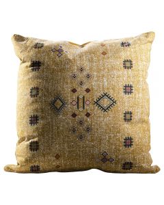 yellow pillow with southwestern graphic