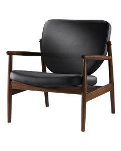 Sleek black vinyl accent chair with walnut-metal frame.