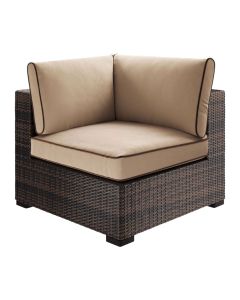 corner chair with tan cushions