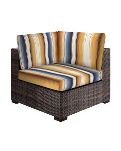 custom striped graphic slipcover over cushions on corner chair