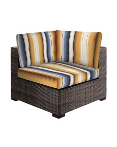 custom striped graphic slipcover over cushions on corner chair