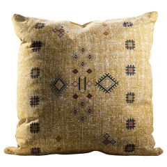 yellow pillow with southwestern graphic