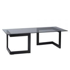 Event rental black glass-top cocktail table with black base. 