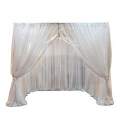 Elegant sheer white cabana-styled drapery.