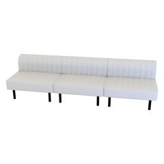 white modular sofa with rounded low back