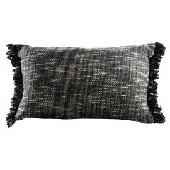textured lumbar pillow with frayed edges
