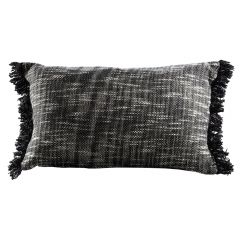 black and white lumbar pillow with frayed edges