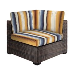 custom striped graphic slipcover over cushions on corner chair