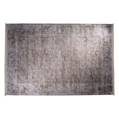 Large distressed-patterned rug area rug with neutral beige tones. 