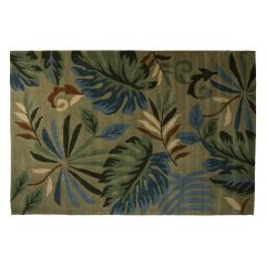 Dark green tropical print rug. 