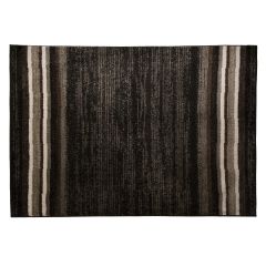 Large textured area rug with various brown and neutral tones.  