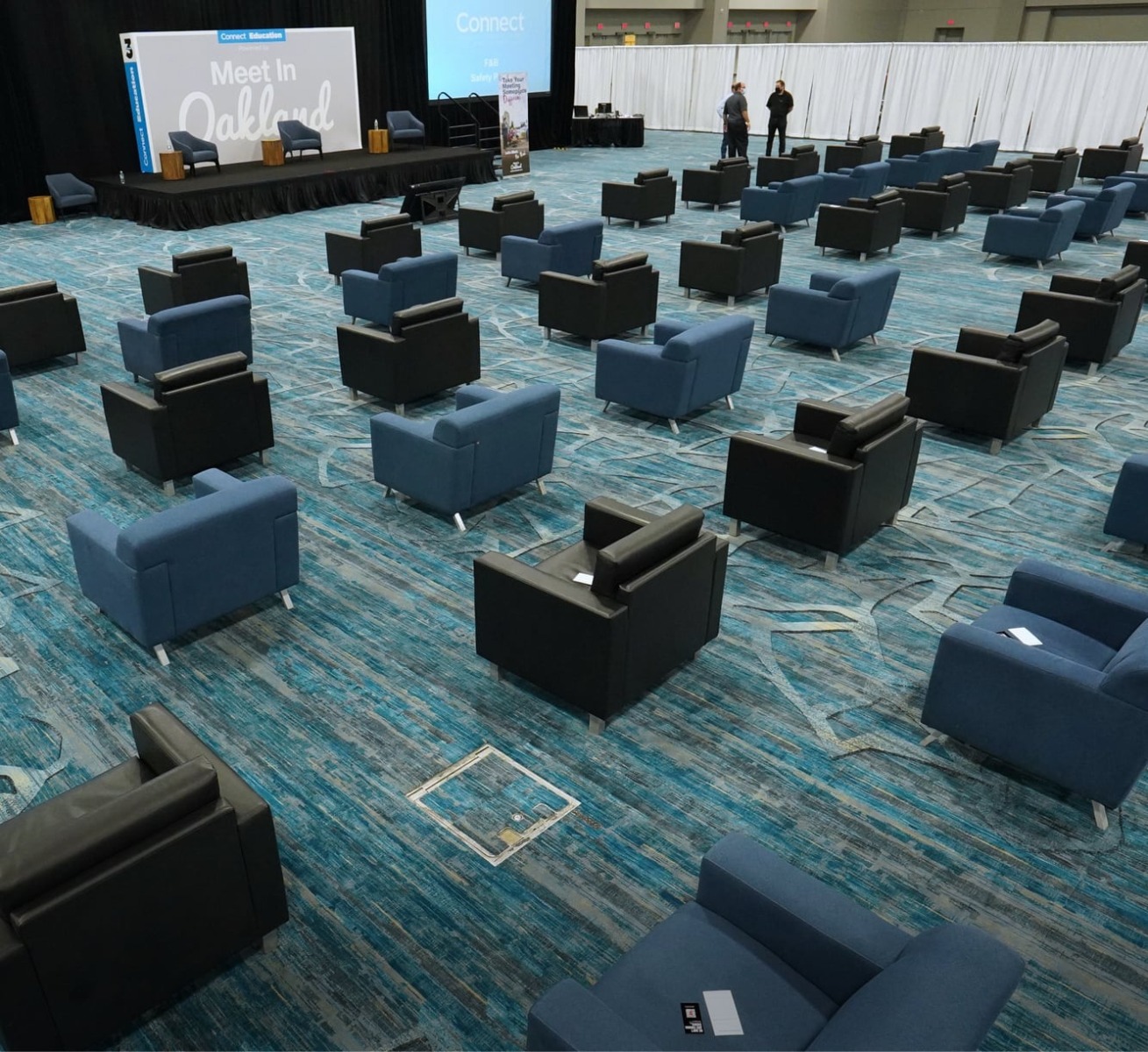 black and blue chairs in socially distanced general sesion