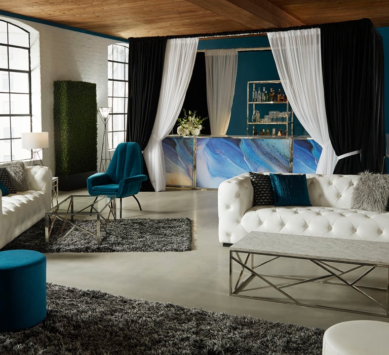 lounge with white and teal furniture