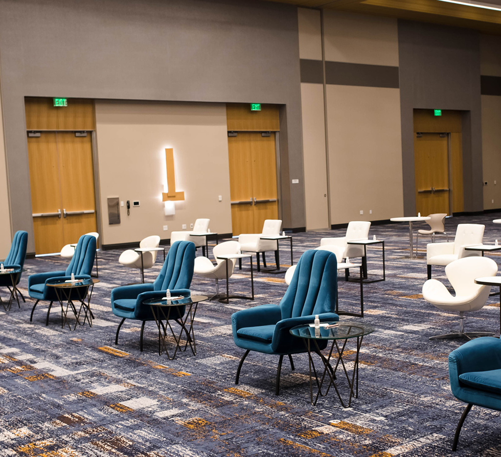 teal and white chairs for audience