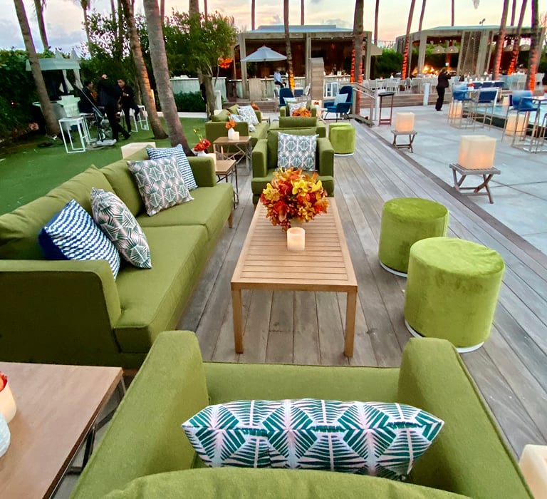 outdoor soft seating at poolside event