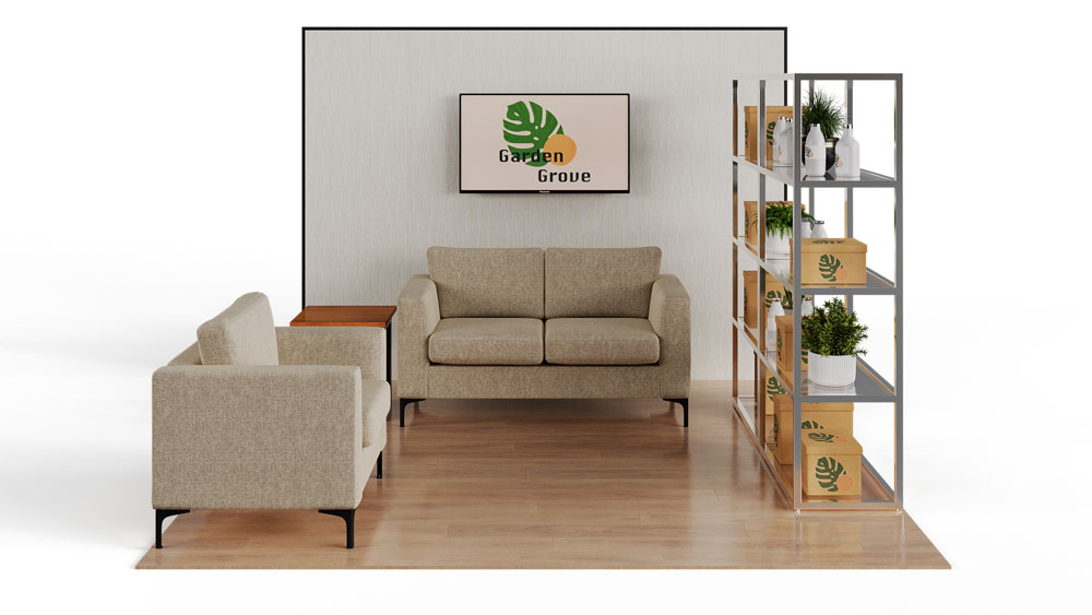 green soft seating set up with life like trees and orange accents