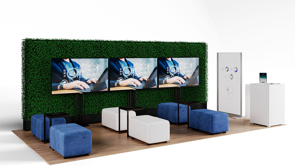 green soft seating set up with life like trees and orange accents